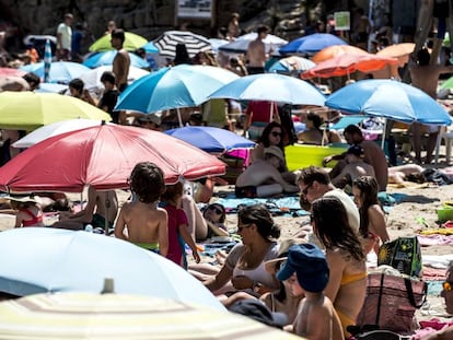 A busy beach on the Costa Brava.