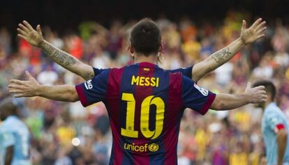 Messi celebra con Rakitic su gol al Granada tras asistencia del argentino.