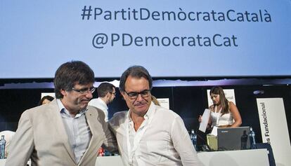 Carles Puigdemont, junto a Artur Mas en el congreso que fund&oacute; el PDC.