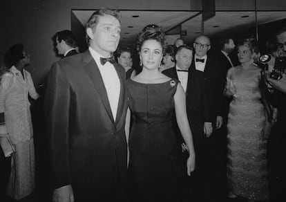 Elizabeth Taylor and her husband, Richard Burton, attend the Broadway premiere of 'Hamlet' in April 1964.