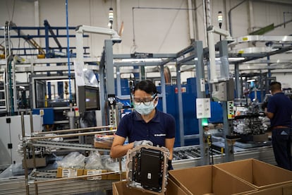 A worker at the BorgWarner Inc. manufacturing facility in San Luis Potosi, Mexico.