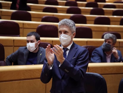 Fernando Grande Marlaska aplaude, el pasado 23 de diciembre, la aprobación en el Senado de la ley Celaá.