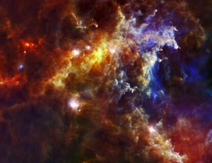 Imagen de la nube molecular donde se están formando estrellas masivas, tomada por el telescopio espacial <i>Herschel</i>, de la Agencia Europea del Espacio.