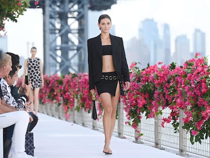 Model on the runway at Michael Kors Spring 2024 Ready To Wear Runway Show at Domino Park on September 11, 2023 in Brooklyn, New York. (Photo by Gilbert Flores/WWD via Getty Images)