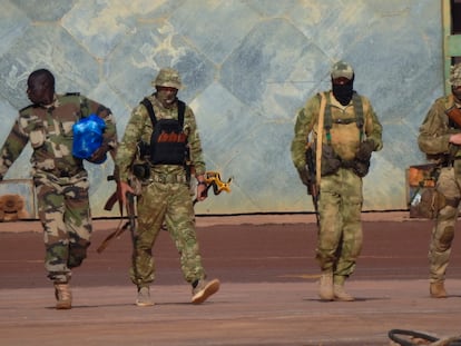 FILE - This undated photograph provided by the French military shows three Russian mercenaries, in northern Mali. The Russian mercenary group that briefly rebelled against President Vladimir Putin’s authority has for years been a ruthless force-for-hire across Africa, protecting rulers at the expense of the masses. That dynamic is not expected to change now that the group’s founder, Yevgeny Prigozhin, has been exiled to Belarus as punishment for the failed rebellion. Neither Russia nor the African leaders dependent on Wagner’s fighters have any interest in ending their relationships. (French Army via AP, File)