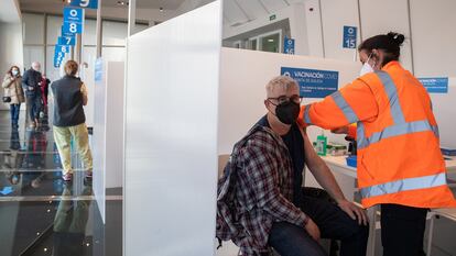 A man gets a shot of the AstraZeneca vaccine in Santiago de Compostela on March 13.