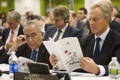 El primer ministro palestino, Salam Fayyad, y Tony Blair, representantes del Cuarteto, en Nueva York.