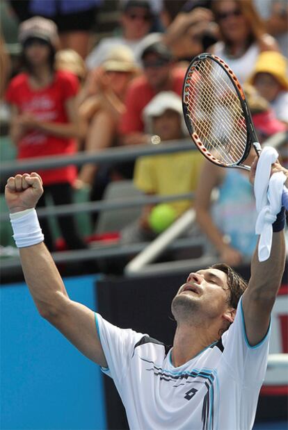 Ferrer celebrates his straight sets win over Richard Gasquet.