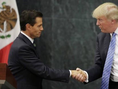 Enrique Peña Nieto and Donald Trump shaking hands in Mexico.