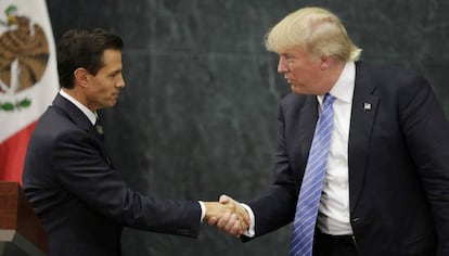 Enrique Peña Nieto and Donald Trump shaking hands in Mexico.