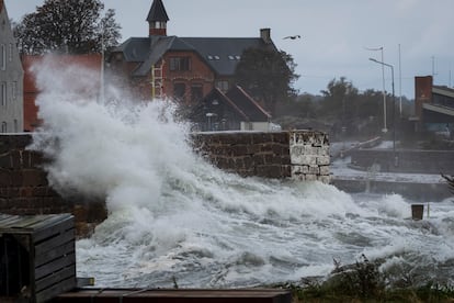 Waves hit Allinge harbor during strong gusts of wind on the island of Bornholm's northern coast, Denmark, 20 October 2023