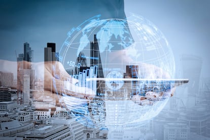 Double exposure of success businessman using digital tablet with london building and social media diagram
