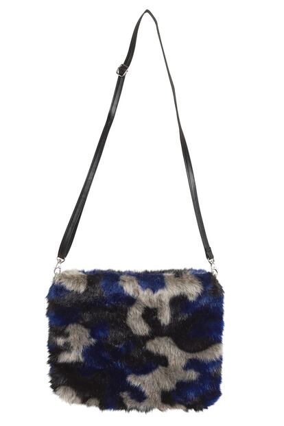 Bolso estampado de Monki (30 euros).