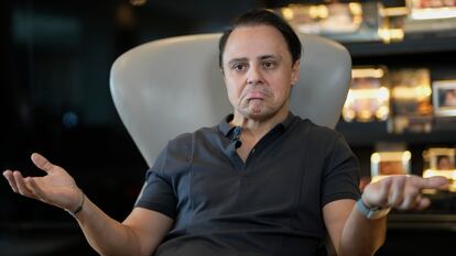 Former Formula One driver Felipe Massa speaks during an interview at his home in Sao Paulo, Brazil, Thursday, Aug. 31, 2023. Massa sent a letter to the FIA accusing auto racing's governing body of conspiring to prevent him from winning the series title in 2008. (AP Photo/Andre Penner)