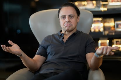 Former Formula One driver Felipe Massa speaks during an interview at his home in Sao Paulo, Brazil, Thursday, Aug. 31, 2023. Massa sent a letter to the FIA accusing auto racing's governing body of conspiring to prevent him from winning the series title in 2008. (AP Photo/Andre Penner)