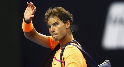 Nadal se despide del público de Pekín tras caer ante Dimitrov.