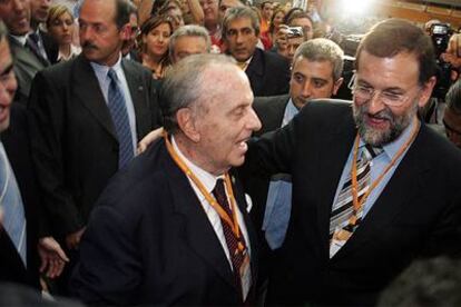 Mariano Rajoy y Manuel Fraga, en el último  congreso del PP.