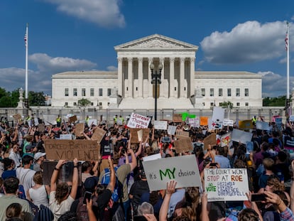 Abortion-rights and anti-abortion demonstrators gather outside the Supreme Court in Washington, Friday, June 24, 2022.