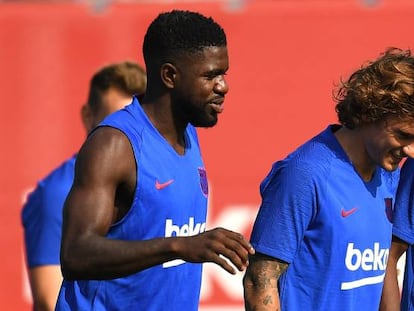 Umtiti, Griezmann y Dembélé, en la última sesión del Barça.