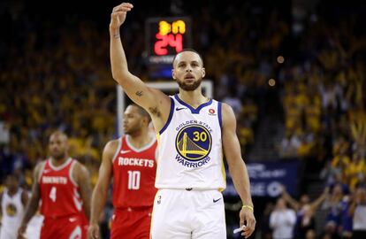 Curry celebra una de sus canastas ante Houston.