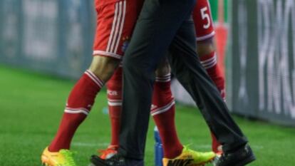 Ribéry y Guardiola celebran la victoria.