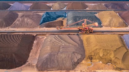 Iron ore piled up at the port of Rizhao in China.