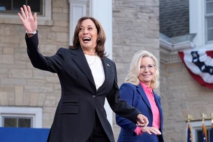 Democratic presidential nominee Vice President Kamala Harris, left, arrives to speak at a campaign event with former Congresswoman Liz Cheney, R-Wyo., right, at Ripon College in Ripon, Wis., Thursday, Oct. 3, 2024. (AP Photo/Mark Schiefelbein)