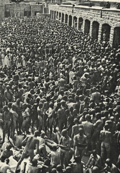 Prisoners wait to be disinfected in June 1941.