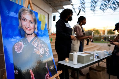 An image of cinematographer Halyna Hutchins, who died after being shot by Alec Baldwin on the set of his movie "Rust", is displayed at a vigil in her honour in Albuquerque, New Mexico, U.S., October 23, 2021.