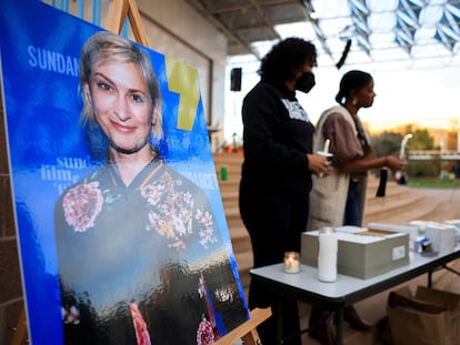An image of cinematographer Halyna Hutchins, who died after being shot by Alec Baldwin on the set of his movie "Rust", is displayed at a vigil in her honour in Albuquerque, New Mexico, U.S., October 23, 2021.