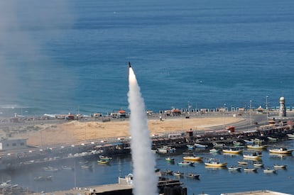 A Palestinian rocket launched from Gaza streaks toward Israel.