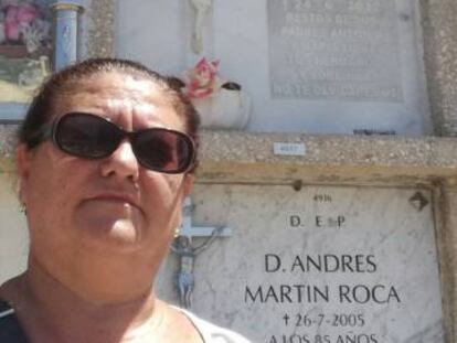 Juana Escudero Lezcano beside the tomb of her namesake.