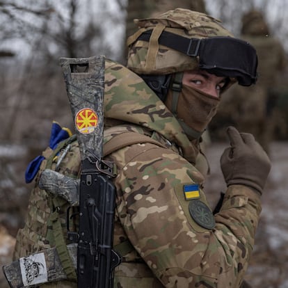 A member of the 3rd Separate Assault Brigade (Azov Unit) of the Armed Forces of Ukraine prepares to fire 152 mm howitzer 2A65 Msta-B, amid Russia's attack on Ukraine, near Bahmut, in Donetsk region, Ukraine, February 6, 2023. REUTERS/Marko Djurica