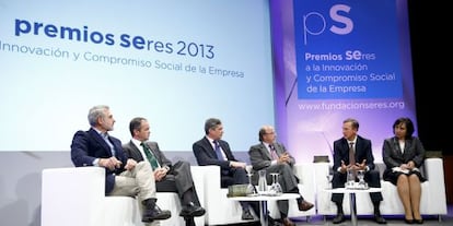 Representantes de las empresas premiadas, con Juan Arena.