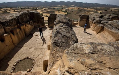 The building sits atop a hill with a sheer cliff protecting it on one side.