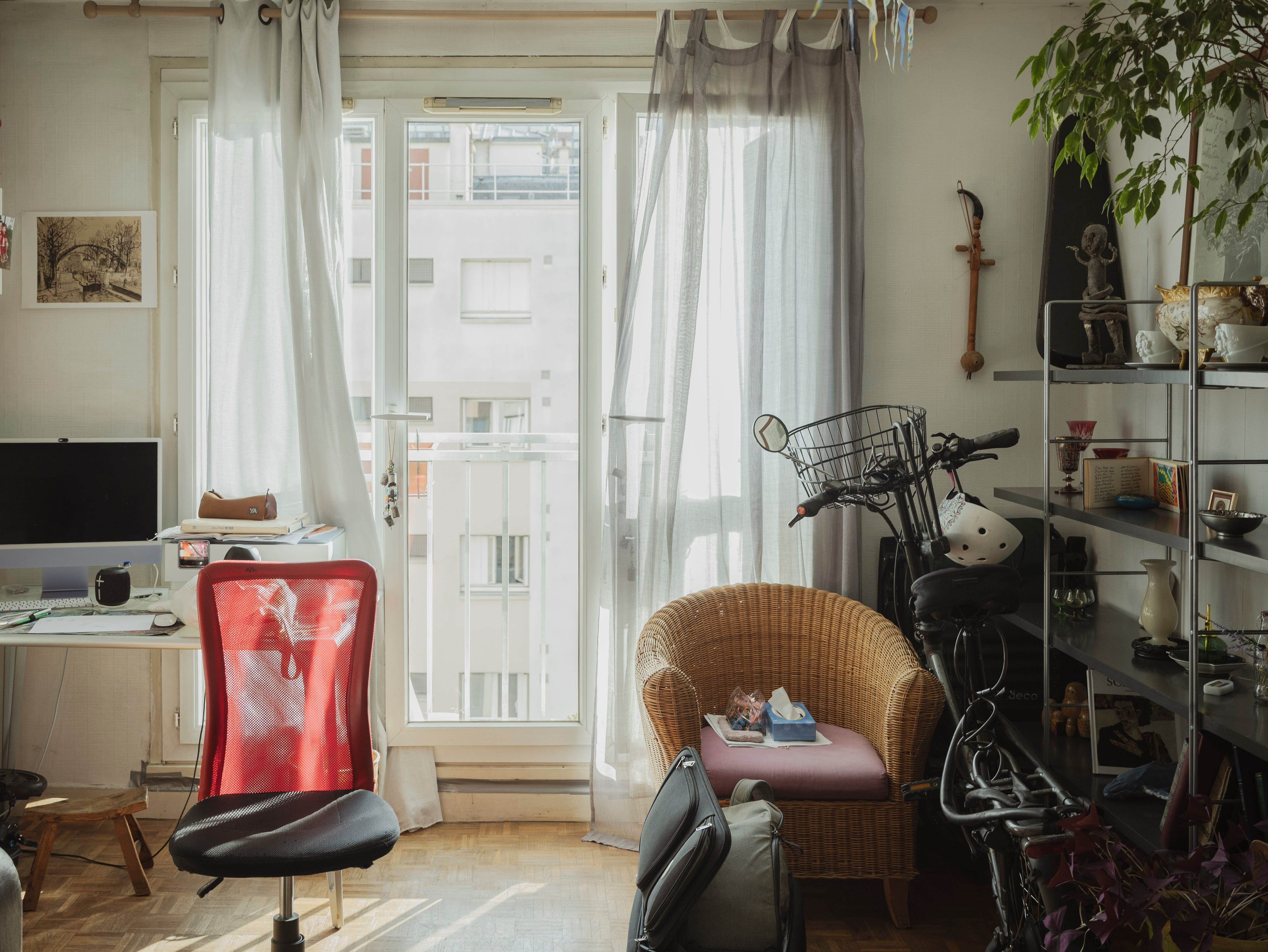 Ventanales de la familia Chevallier y sus cortinas, en París.
