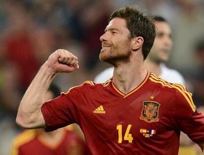 Spanish midfielder Xabi Alonso celebrates after scoring against France.