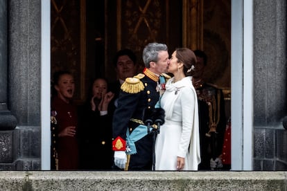 Newly proclaimed King Frederick and Queen Mary of Denmark kiss on the balcony of Christiansborg Palace in Copenhagen on January 14, 2024.