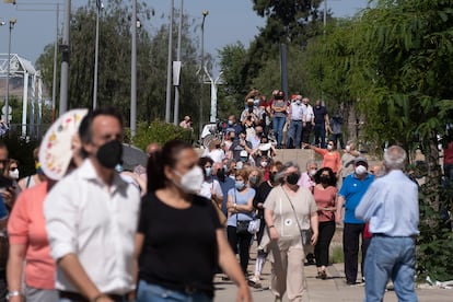 Lines outside a vaccination center at Seville's Olympic Stadium.