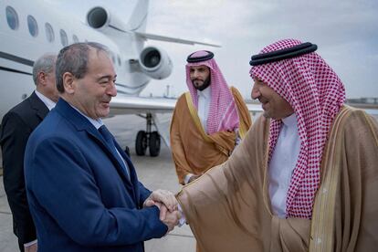 Saudi Deputy Foreign Minister Walid al-Khuraiji receiving Syrian Foreign Minister Faisal Mekdad upon his arrival at the airport of Jeddah on April 12, 2023.