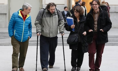 Guillermo Zapata (on crutches) with other Ahora Madrid coalition members outside City Hall on Thursday.