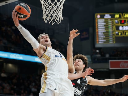 Alessandro Pajola defiende a Mario Hezonja, durante el partido de Euroliga de baloncesto entre el Real Madrid y Virtus Bologna.