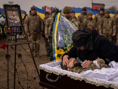 Tetiana Hurieieva, the mother of Volodymyr Hurieiev, a Ukrainian soldier killed in Bakhmut, cries during the funeral in Boryspil, Ukraine, on Saturday, March 4, 2023.