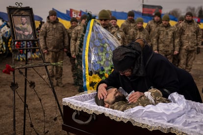 Tetiana Hurieieva, the mother of Volodymyr Hurieiev, a Ukrainian soldier killed in Bakhmut, cries during the funeral in Boryspil, Ukraine, on Saturday, March 4, 2023.