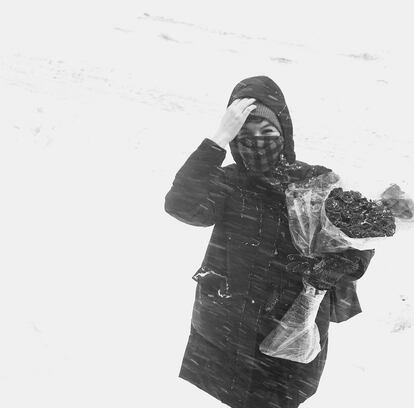 "Jesse with flowers in the snow," reads this entry featuring Smith's daughter.