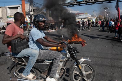 Protesters in Port-au-Prince demand the resignation of Ariel Henry on Thursday.