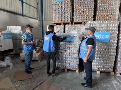 Workers from the United Nations Palestinian Refugee Agency (UNRWA) prepare medical aid for distribution at a warehouse in Deir Al-Balah, Gaza, on November 4, 2023.