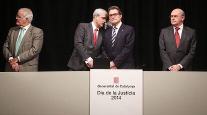 De izquierda a derecha, el fiscal superior de Cataluña, el consejero de Justicia, el presidente de la Generalitat y el presidente del TSJC.