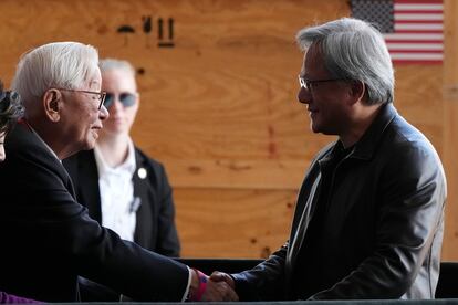 Taiwan Semiconductor Manufacturing Company founder Morris Chang shakes hands with Nvidia Co-founder, President, and CEO Jensen Huang