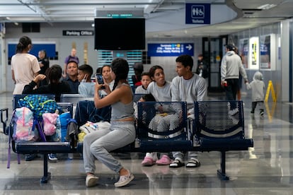 Run by a private firm hired by the city, migrants stay in a makeshift shelter at O'Hare International Airport, Wednesday, Sept. 20, 2023, in Chicago